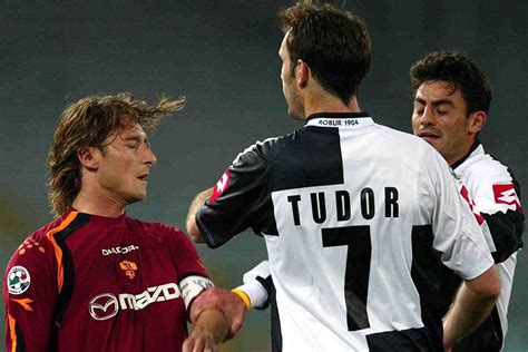 tudor slaps totti|Totti faces lengthy ban .